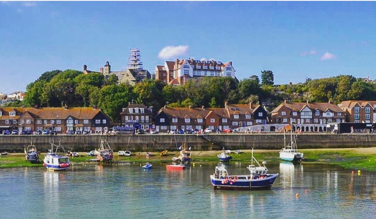 Folkestone Harbour with boats and traditional buildings